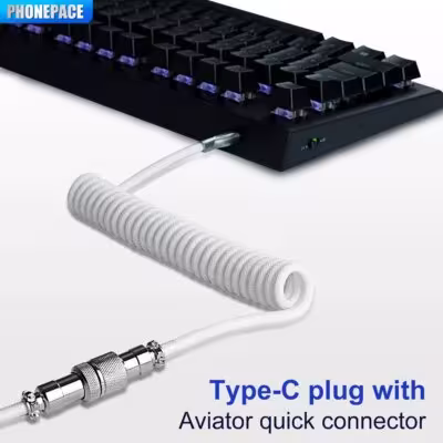 Clavier mécanique avec câble USB Type-C enroulé et connecteur aviateur