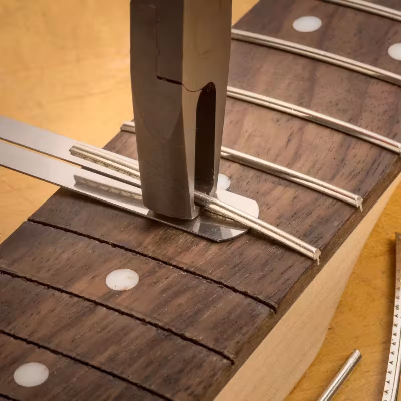 gitaros stygų įrankis plieninės replės