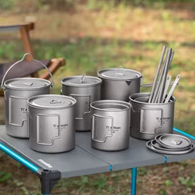 Titanium portable tea and coffee mug with folding handle