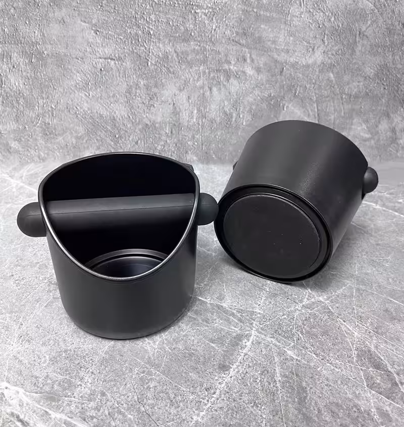 vaschetta battifondo per caffè