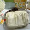 white-m-strap