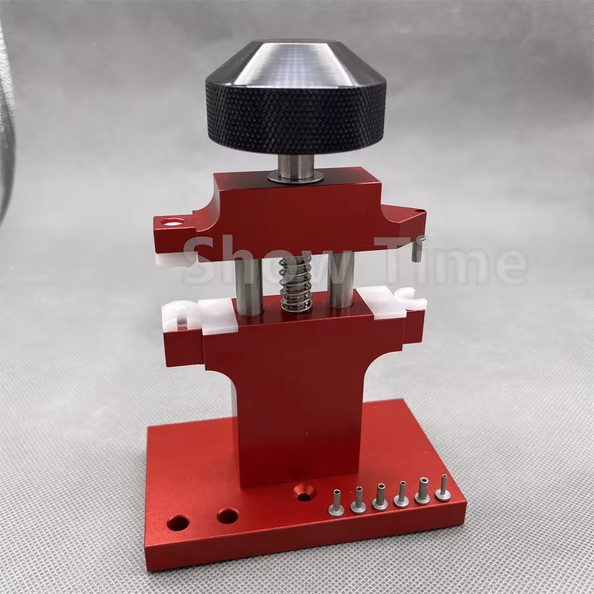 Clock repair tool with a button removal function and 7 impact bits, designed for professional use.