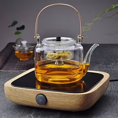 Teiera in vetro con manico in bambù adatta al piano cottura, con filtro per tè ed erbe, ideale anche per caffè.