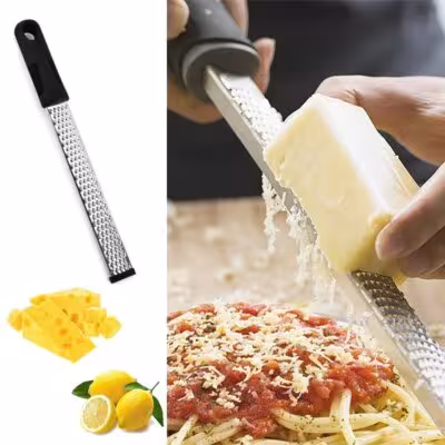 Stainless steel kitchen grater for grating cheese, lemon zest, chocolate, and vegetables with a comfortable handle