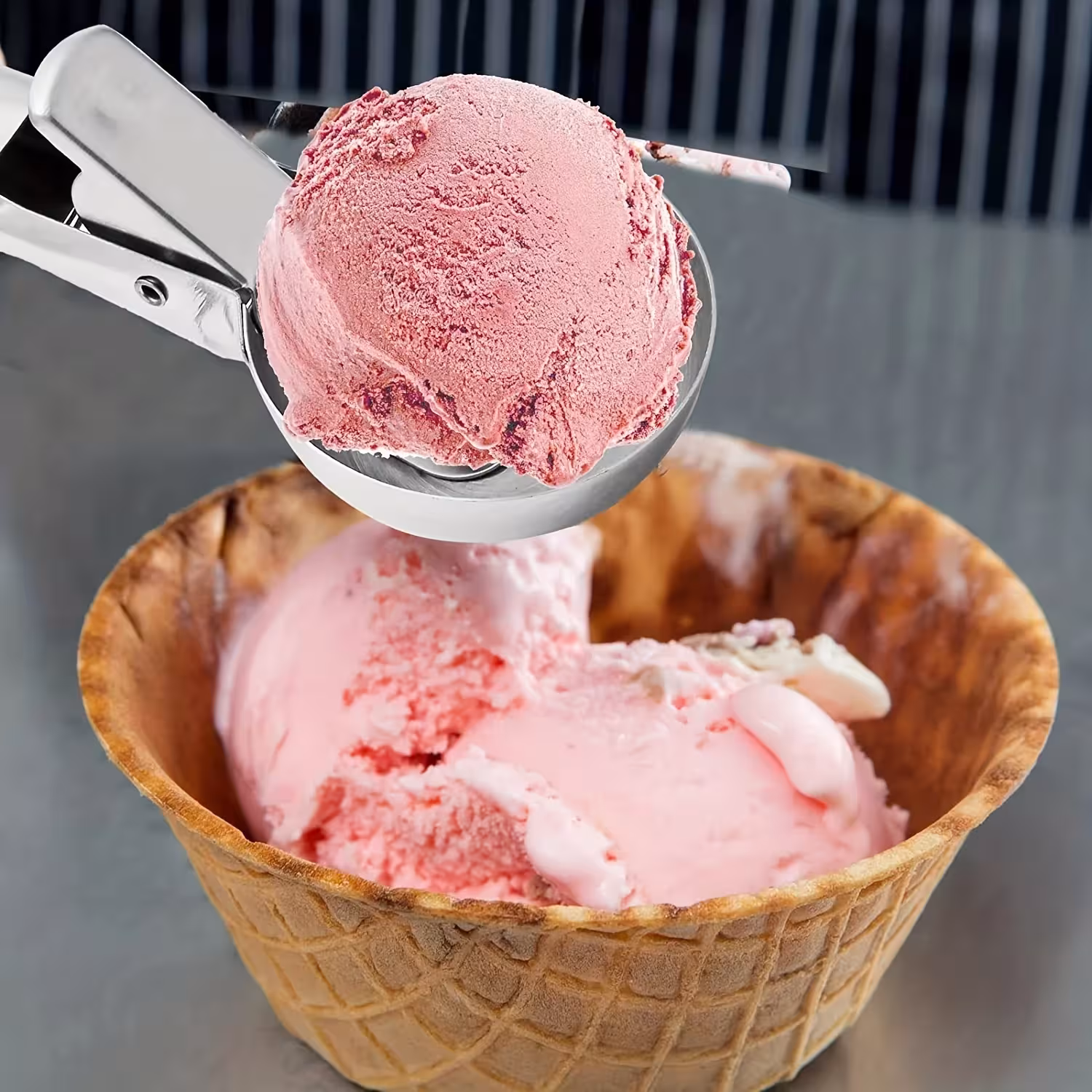 Cuchara para helado de acero inoxidable.