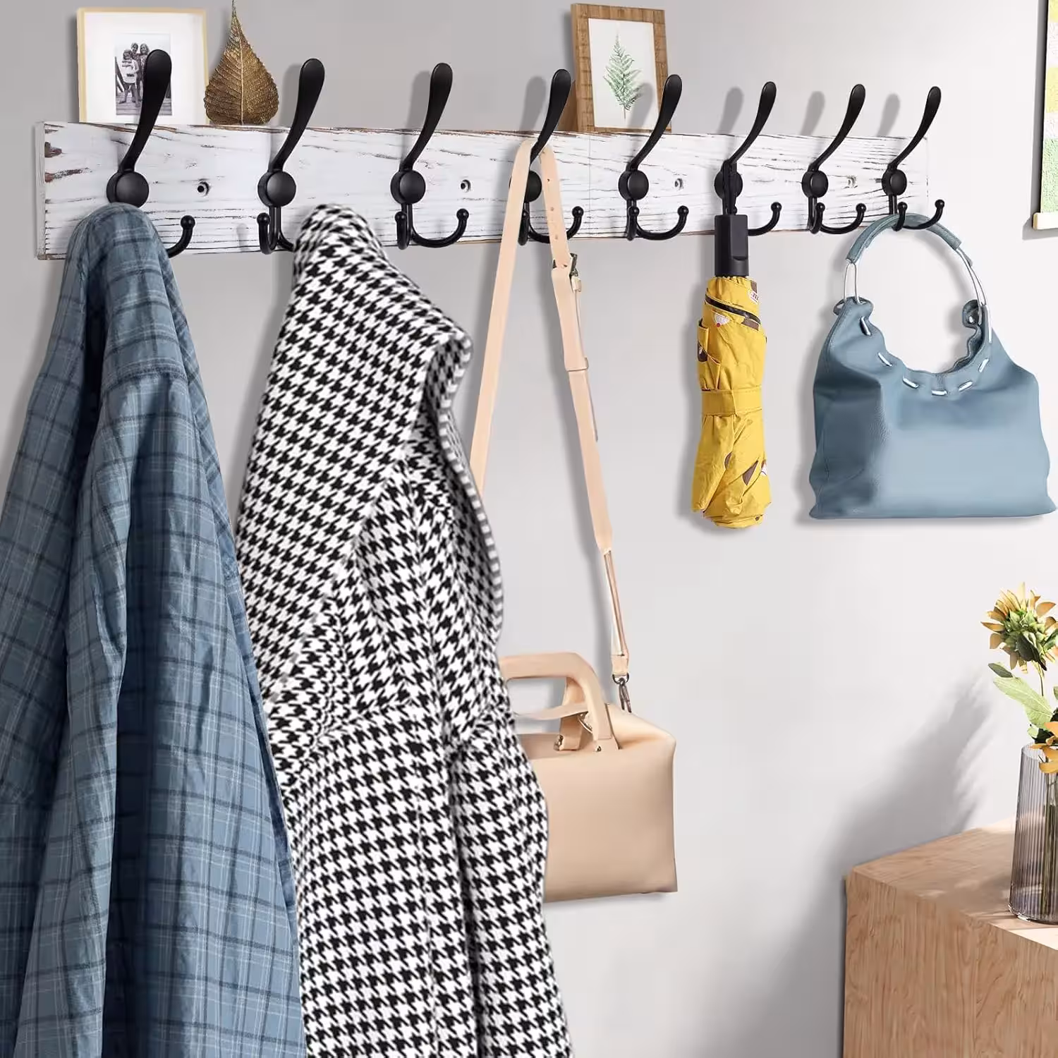 Wall-mounted coat rack with hooks
