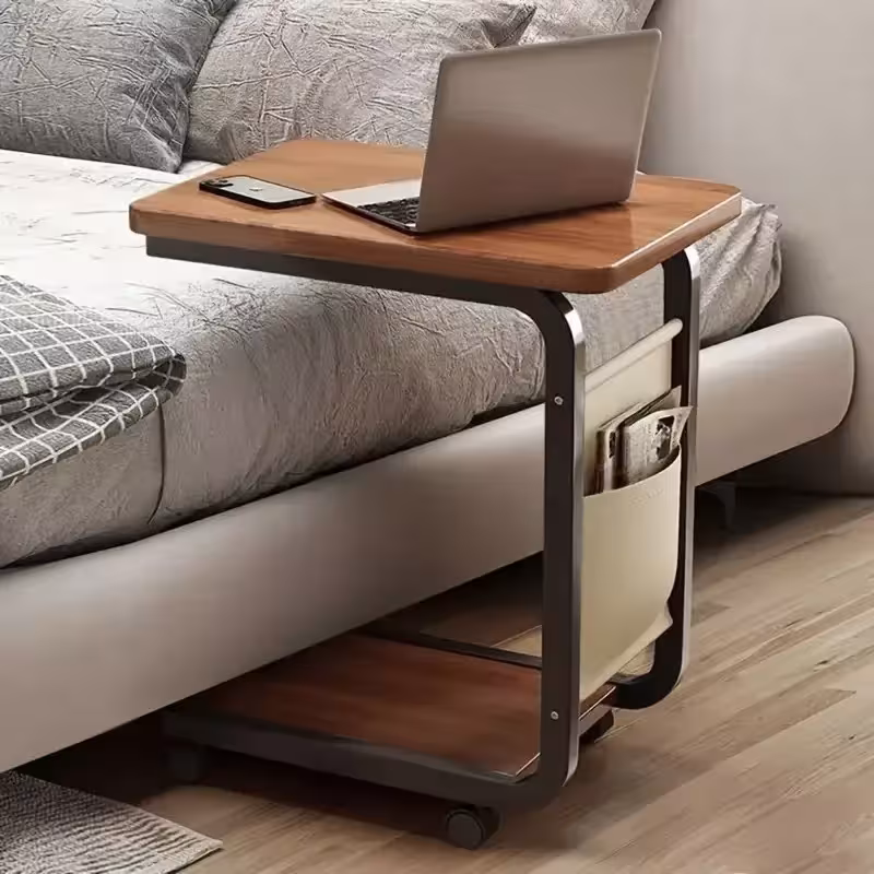 Brown rolling side table with a storage box – a solid wood C-shaped table for sofas and beds, with a metal frame.