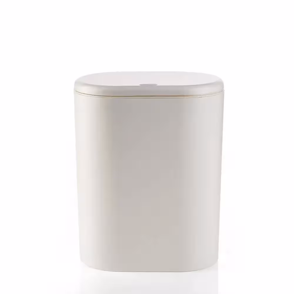 Garbage bin with toilet brush
