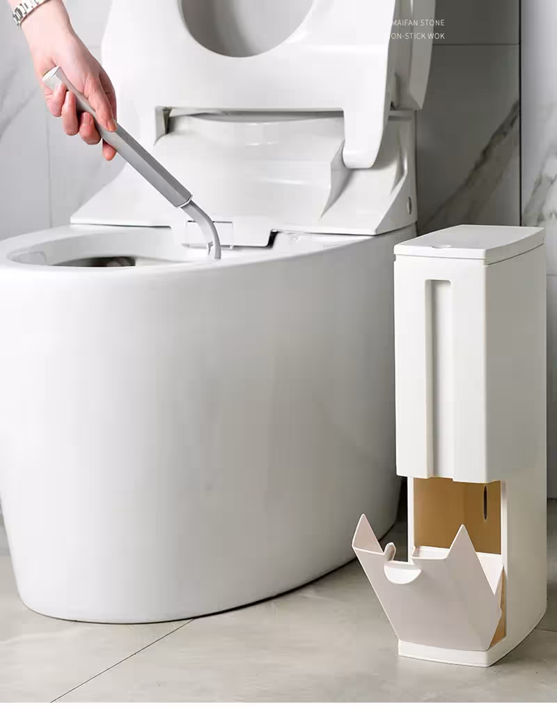 Garbage bin with toilet brush