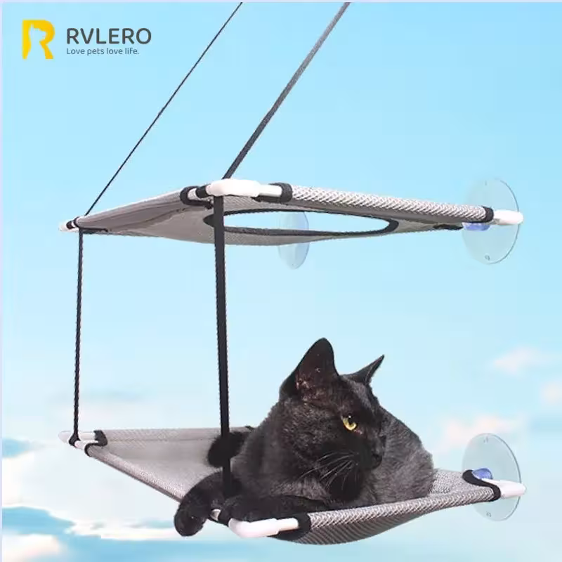 Cama para gatos en la ventana
