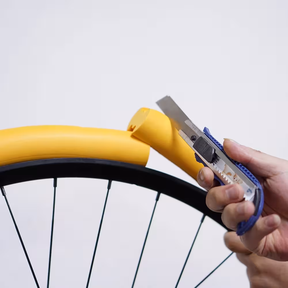 Adaptador para cámara de aire de bicicleta