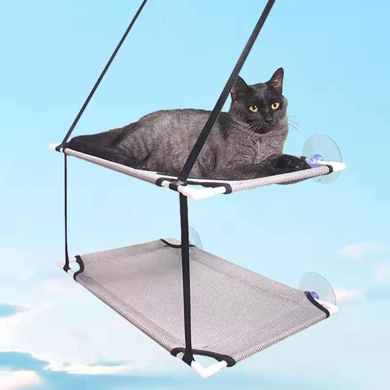 Cama para gatos en la ventana