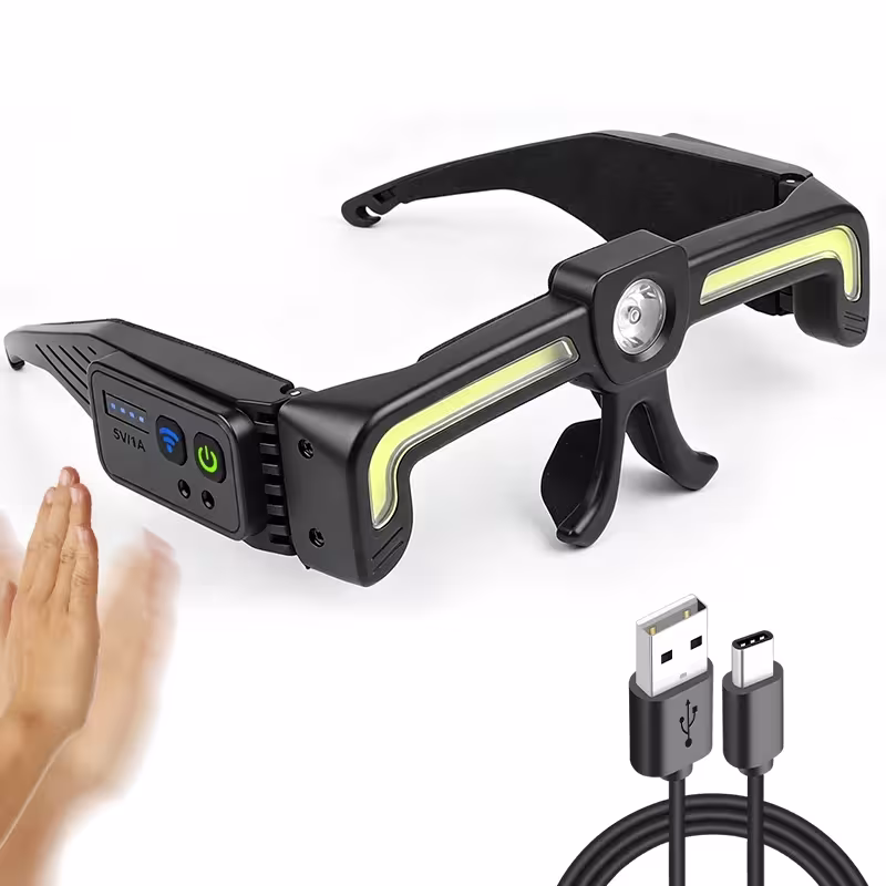Rechargeable LED glasses with COB lighting, wireless sensor, and USB Type-C charging for car repair.