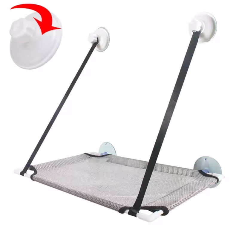 Cama para gatos en la ventana